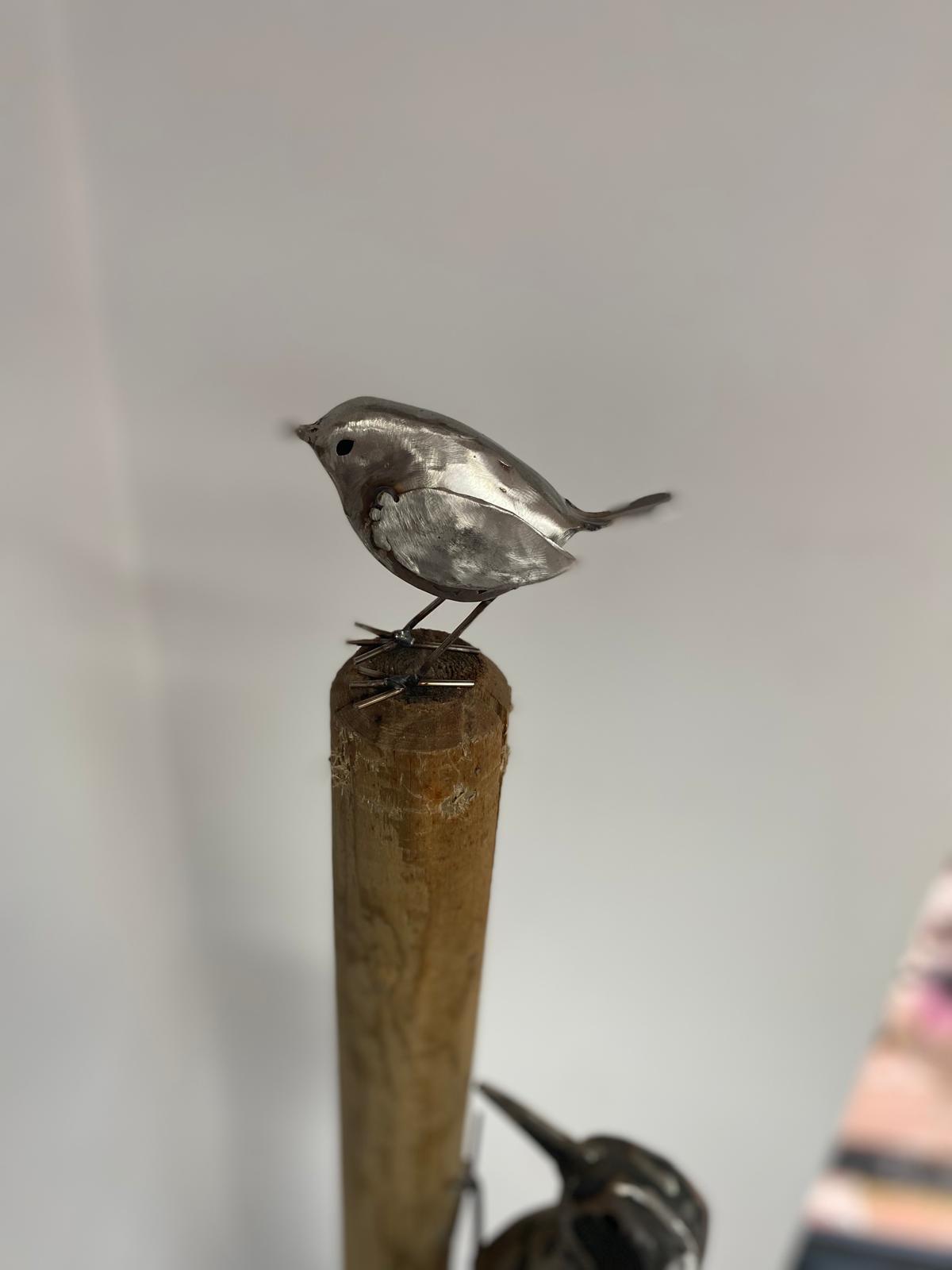 Wren sculpture on post